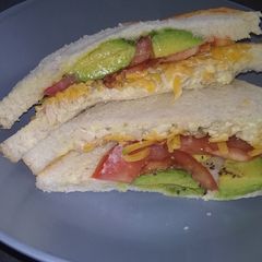 A picture of Chicken mayo, cheese and avocado sandwich.