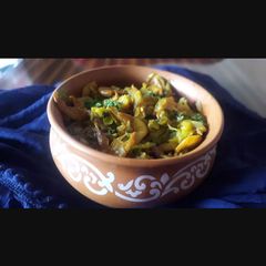A picture of Vegetable of cabbage and Jawla(tiny dry shrimps).
