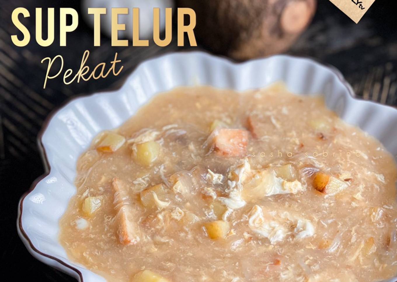 Sup telur pekat dengan serbuk roti dan tauhu