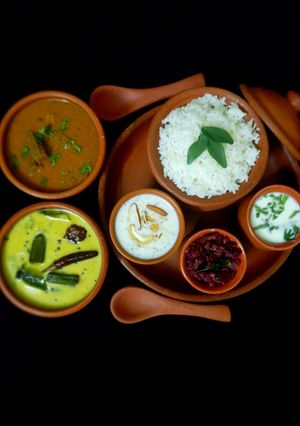 A picture of Tamilnadu Thali - rice, sambar, mor kuzhambu, beetroot poriyal, payasam, buttermilk for lunch.