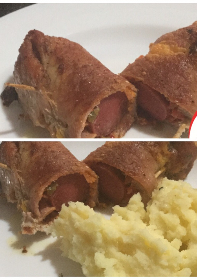 Una foto de Niños envueltos de cerdo, con salchicha al horno y puré de papas