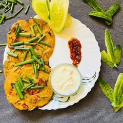 A picture of Spring onion mix flour Thalipith.