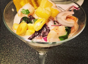 Foto principal de Ceviche de pulpo y langostinos con leche de coco 🥥