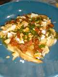 Ensalada de berenjena asada con tomates secos y nueces