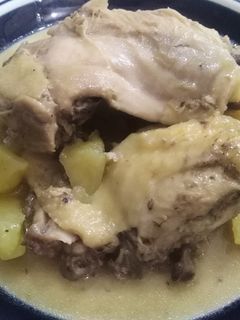 Una foto de Pollo en crema de arroz
