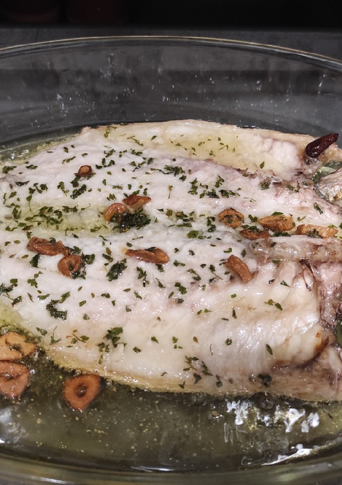 Una foto de Lubina al horno
