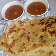 Garlic nan bread wit ALU gravy A picture of Garlic nan bread wit ALU gravy.
