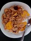 My Bran flakes with Dried Fruit and fresh sliced Mango 😍