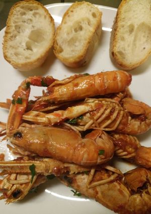 A picture of Langostines in a spicy tomato sauce.