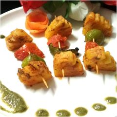 A picture of Achari pineapple tikka.
