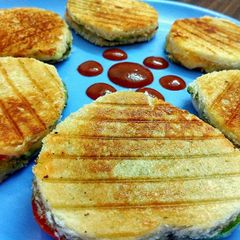 A picture of Heart shaped cheesy sandwich.