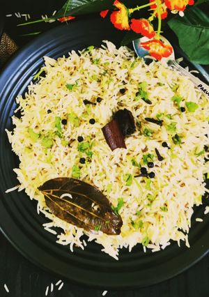 A picture of Jeera Rice with Whole Spices.