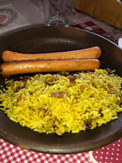 Una foto de Arroz al curry con nuez y tocino