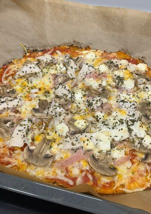 Una foto de Pizza con Base de Zanahoria