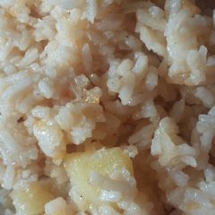 A picture of Fried rice with potatoes.