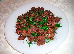 Foto principal de Higadillos de pollo con ajo y perejil a la sartén