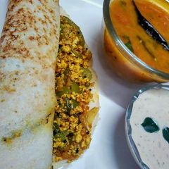 A picture of Paneer masala dosa with shambhar chanadaal chutney.