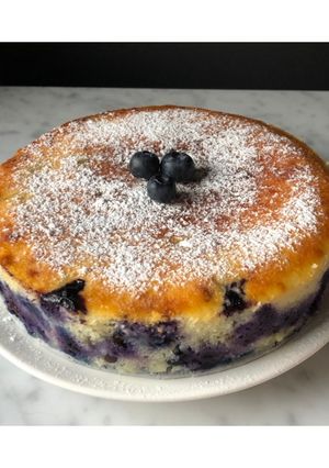 A picture of Ricotta and Yogurt Cake with Chocolate and Blueberries.