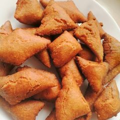 A picture of Half cake mandazi.