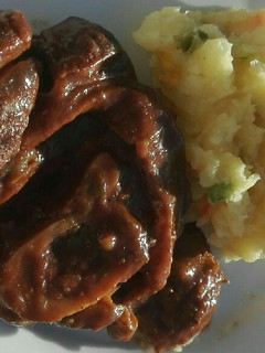 A picture of Mashed potatoes with frozen veg.