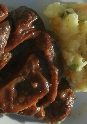 A picture of Mashed potatoes with frozen veg.