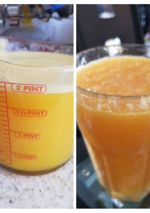 A picture of My 2 Fresh Orange juices smooth & With bits. ❤.