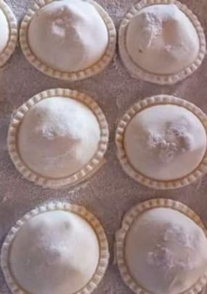 Una foto de Sorrentinos de jamón y queso