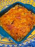 Gratin de pommes de terre aux harengs en conserve tomate et oignons