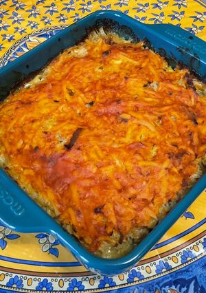Une photo de Gratin de pommes de terre aux harengs en conserve tomate et oignons