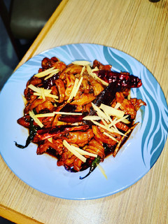 A picture of Easy sweet and spicy pork intestines with pineapple juice.
