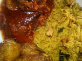 Egg and shredded chicken rice with sauce and fried chicken