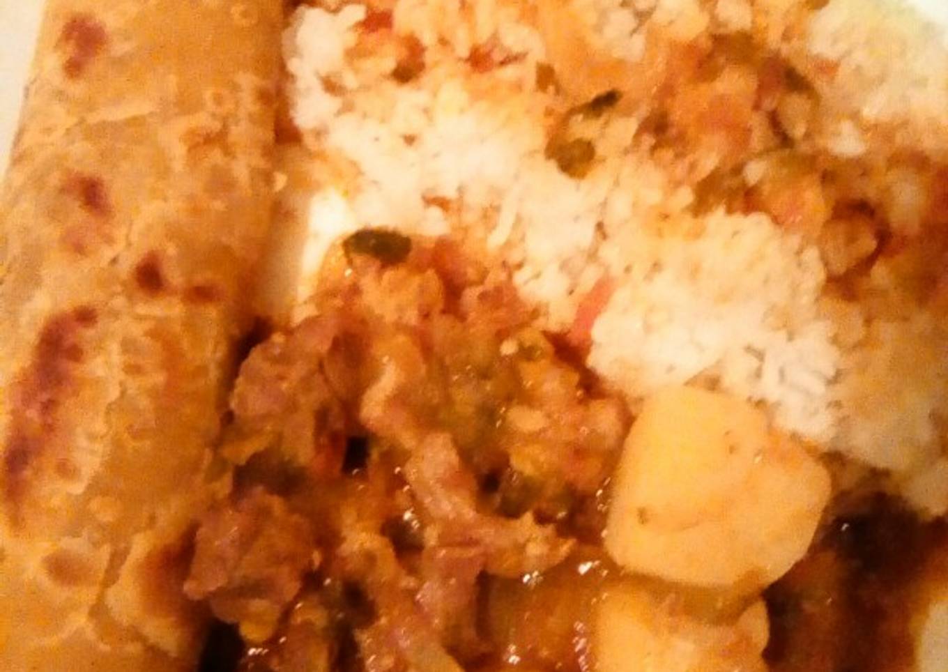 Beef stew served with chapati and rice