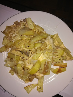 Una foto de Patatas con huevo al horno