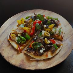 A picture of Veg Tawa Pizza.