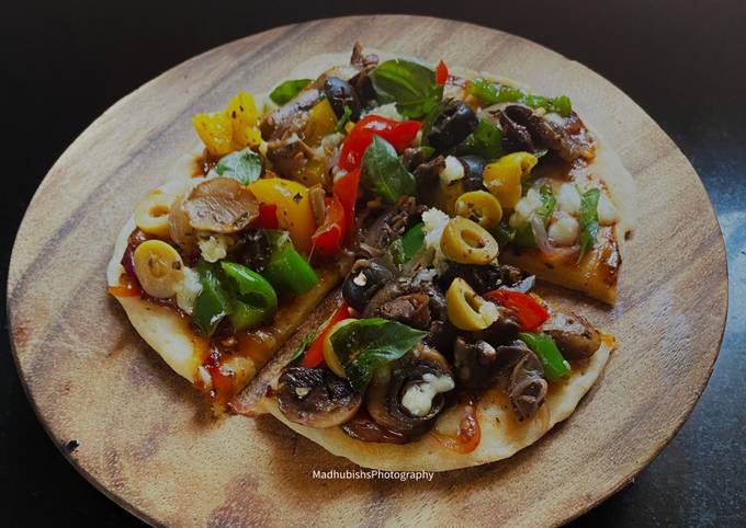 Veg Tawa Pizza Recipe by Madhumita Bishnu - Cookpad