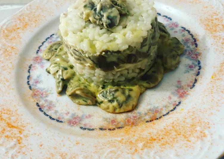 Arroz con champiñones y huevo frito