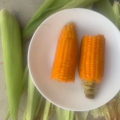 A picture of Sweet buttered corn on the cob.