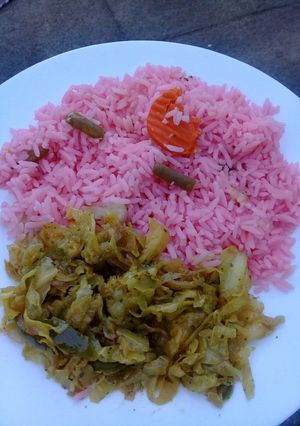 A picture of Pink rice with herbs and cabbage.