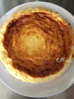 Una foto de Tarta de queso batido y queso grana padano rallado