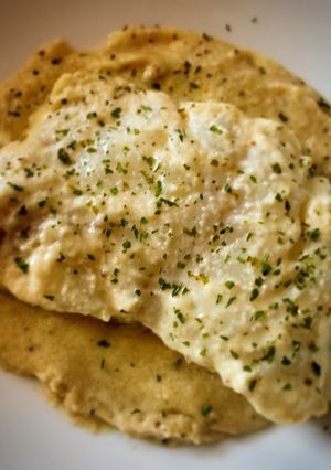 Foto principal de Bacalao con crema de ajo, almendra y parmesano