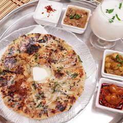 A picture of Cheese paneer pepper stuff kulcha.