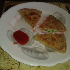 Pizza paratha A picture of Pizza paratha .
