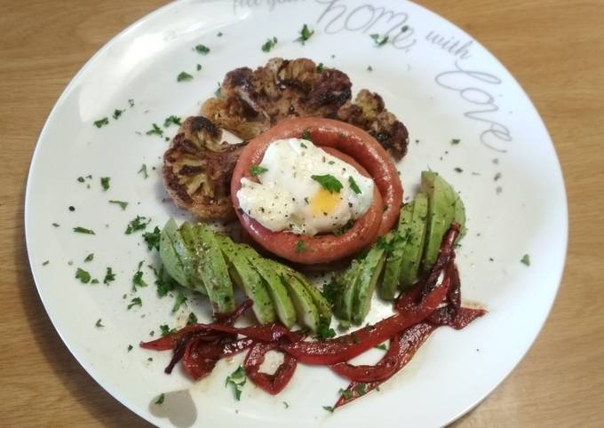 Sausage, Cauliflower Steak with Poached egg and Avo