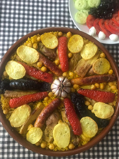 Una foto de Arroz al horno con panceta y todo lo demás