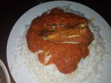 Coconut rice with chicken stew