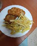 Libritos de solomillo relleno con papas fritas a la pimienta