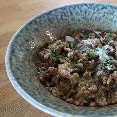A picture of Macho Winter Risotto with biltong and gourmet mushrooms.