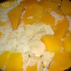 A picture of Kabocha Rice Made in Rice Cooker.