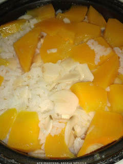 A picture of Kabocha Rice Made in Rice Cooker.