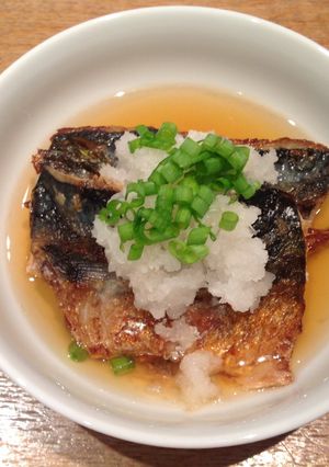 A picture of Grilled mackerel and grated mooli in Japanese style.